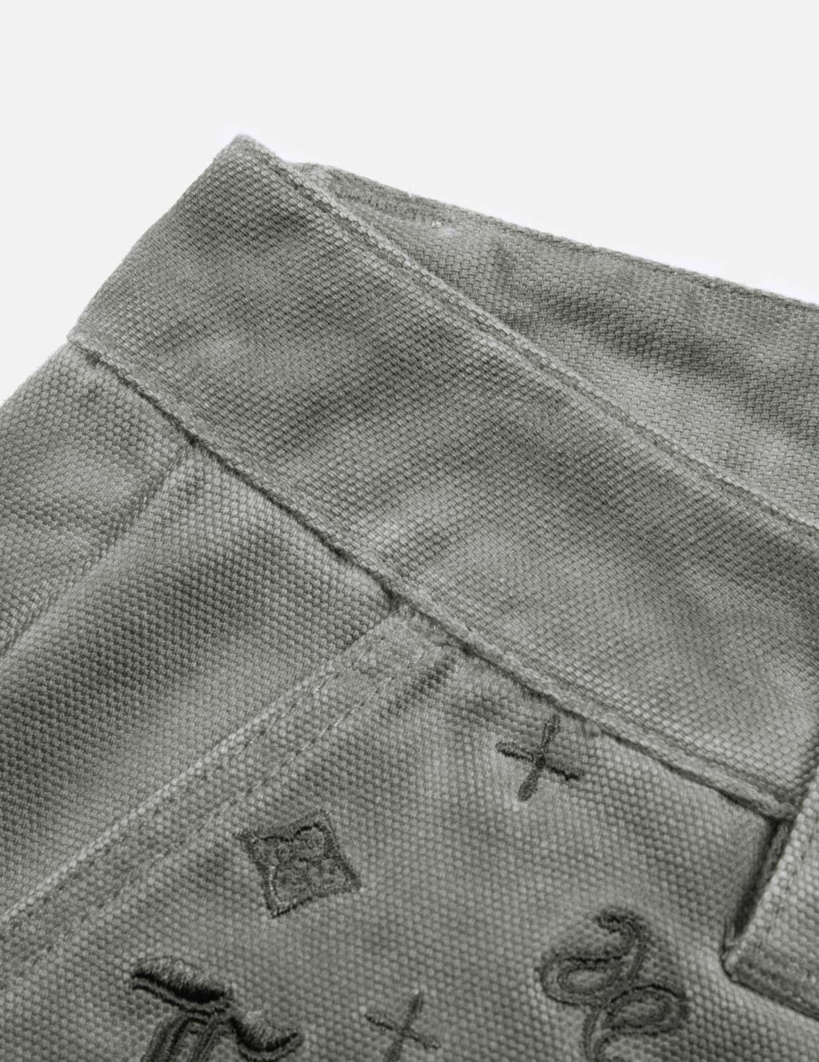 滿地圖案刺繡口袋水洗束腳褲