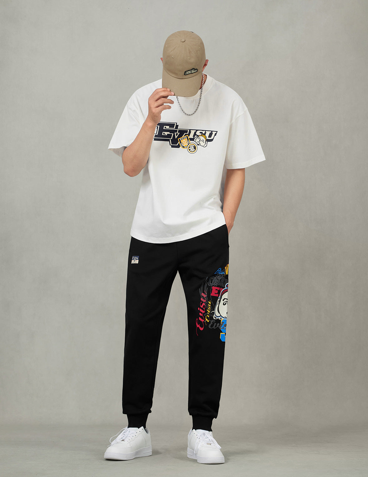 文字繪佛頭與智慧之輪標籤大M印花寬版休閒T恤