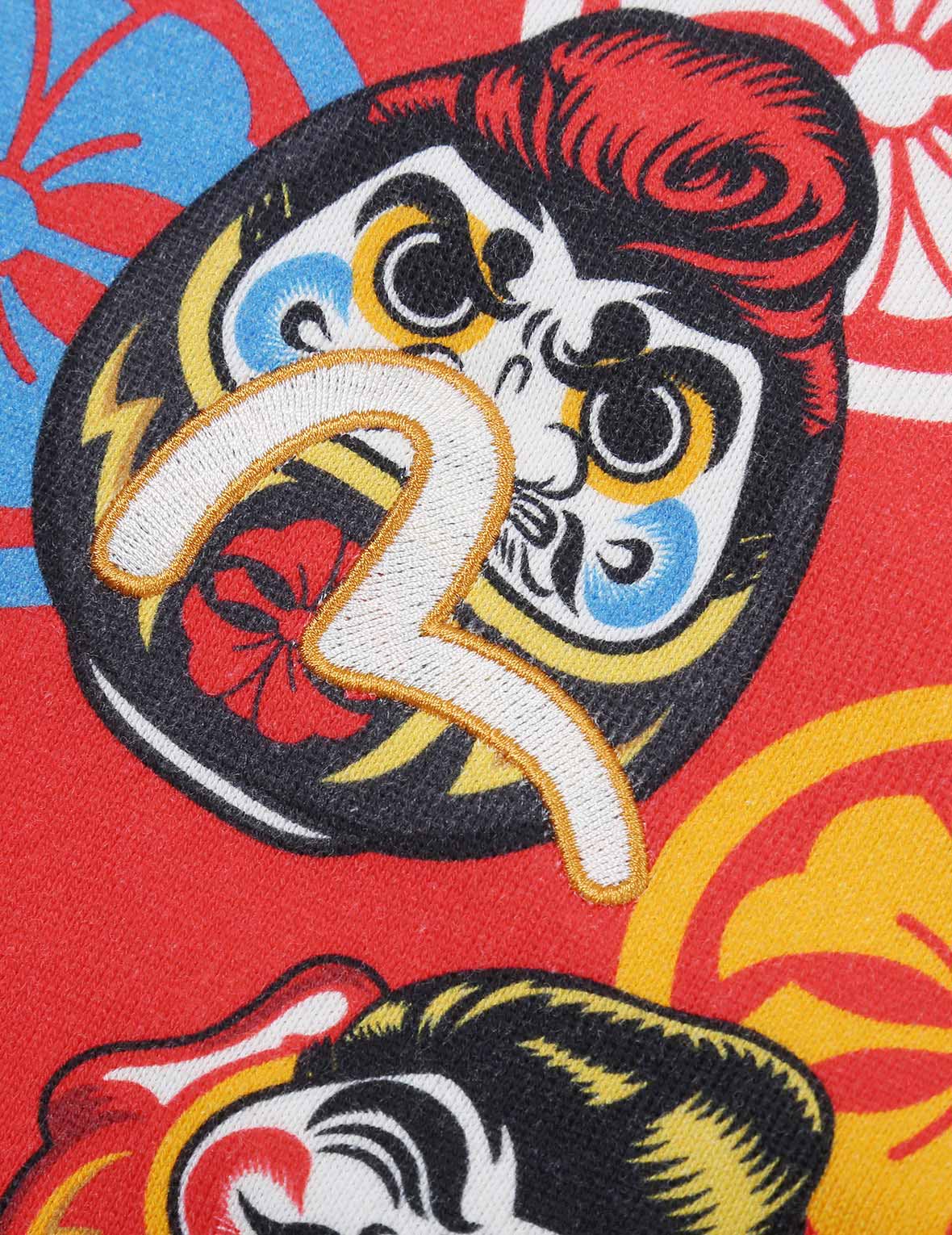 滿地飛機頭達磨印花連帽衛衣