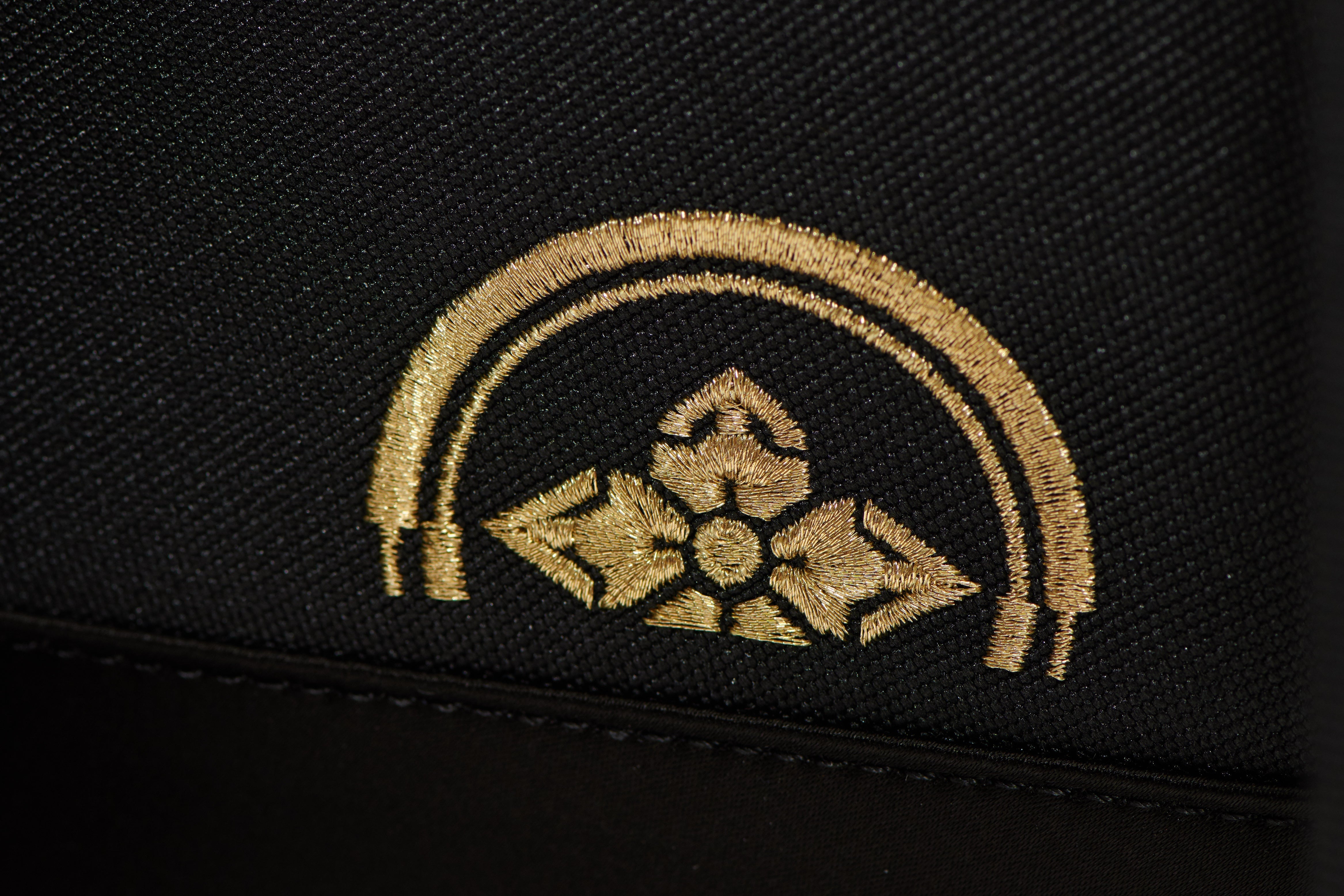海浪紋理Logo刺繡雙肩包