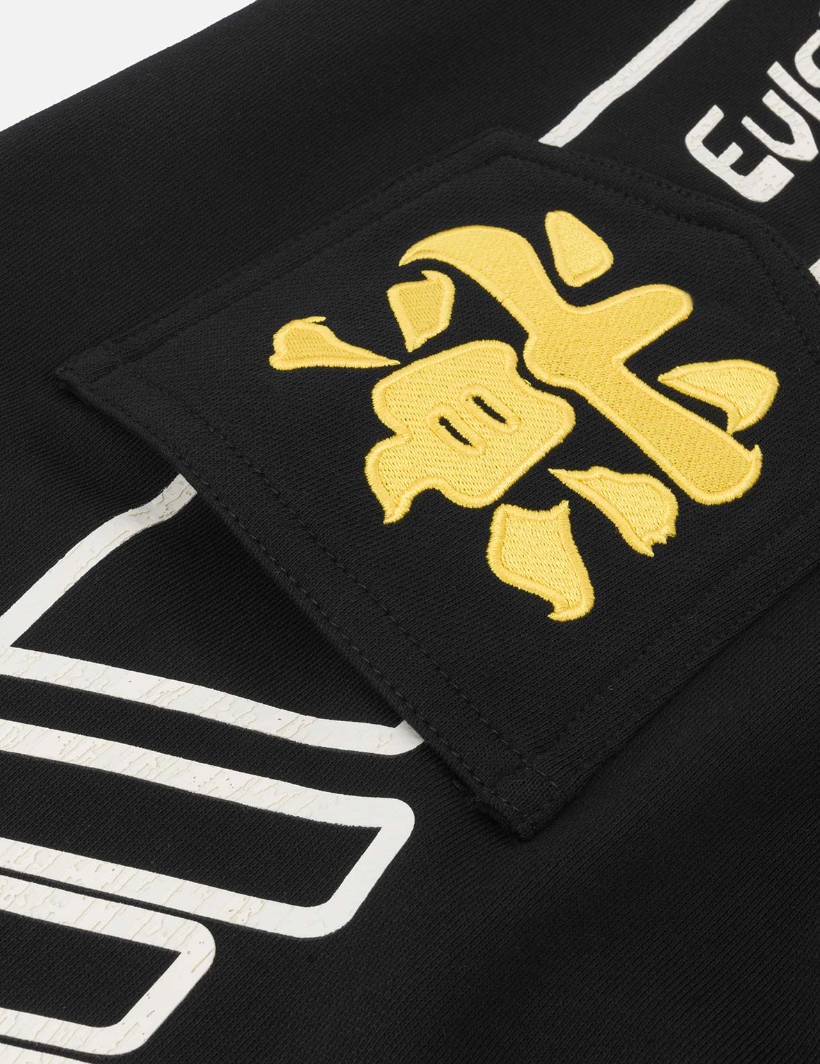 標語大M印花貼布繡口袋寬版運動褲