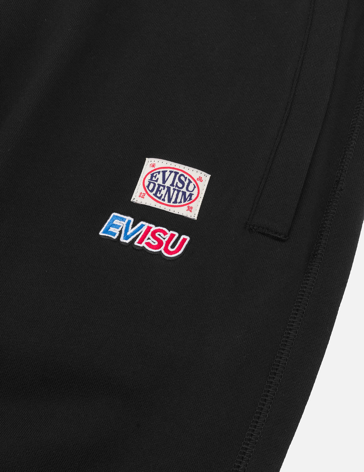 標語大M印花貼布繡口袋寬版運動褲