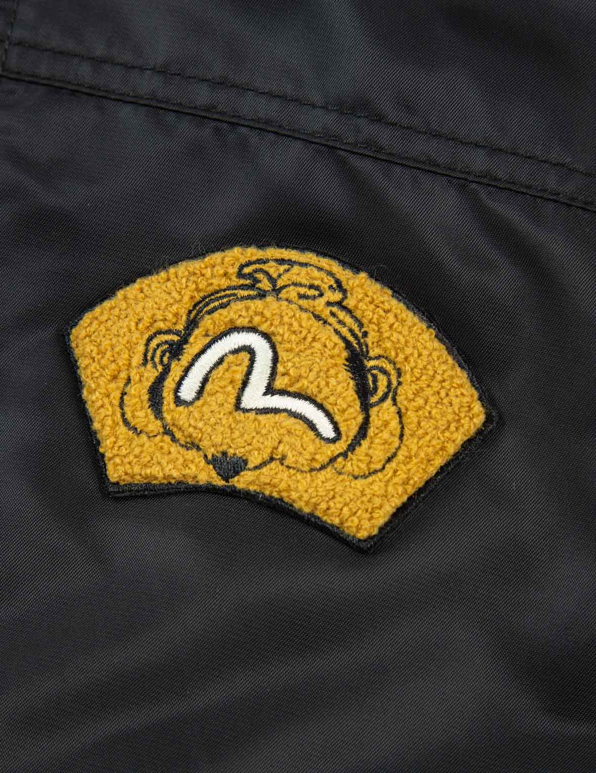 佛頭徽章與格言刺繡夾克