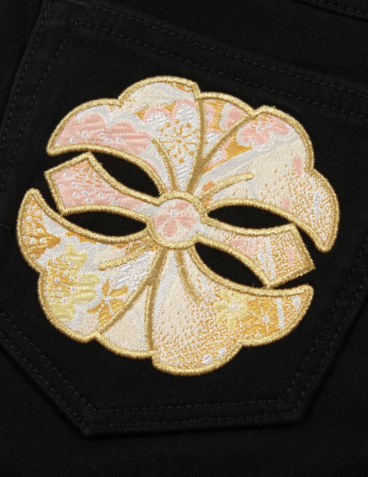 家花和百花織錦貼布身牛仔褲