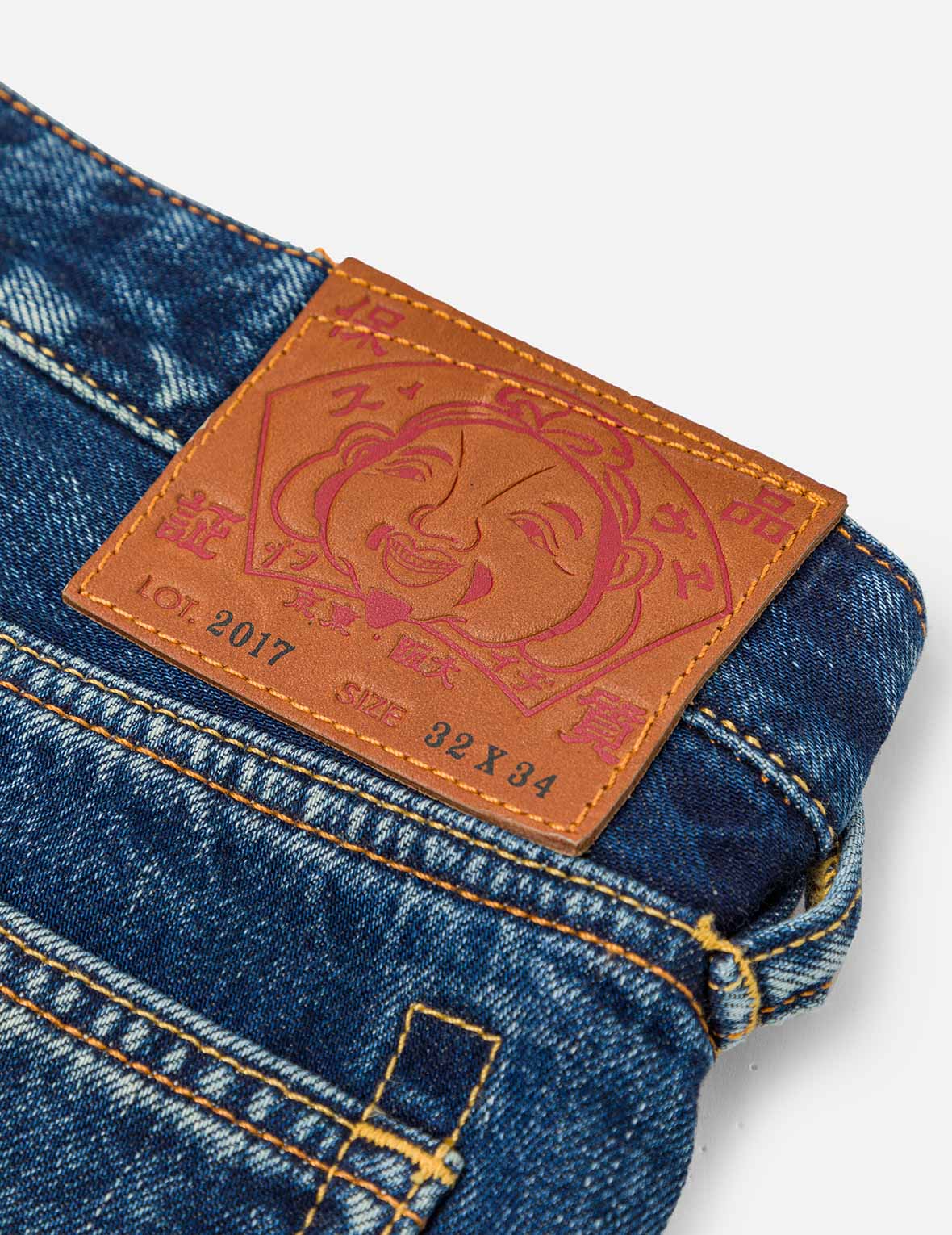 Seagull Embroidery and "EVISU SINCE 1991" Print Patch Carrot Fit Jeans #2017